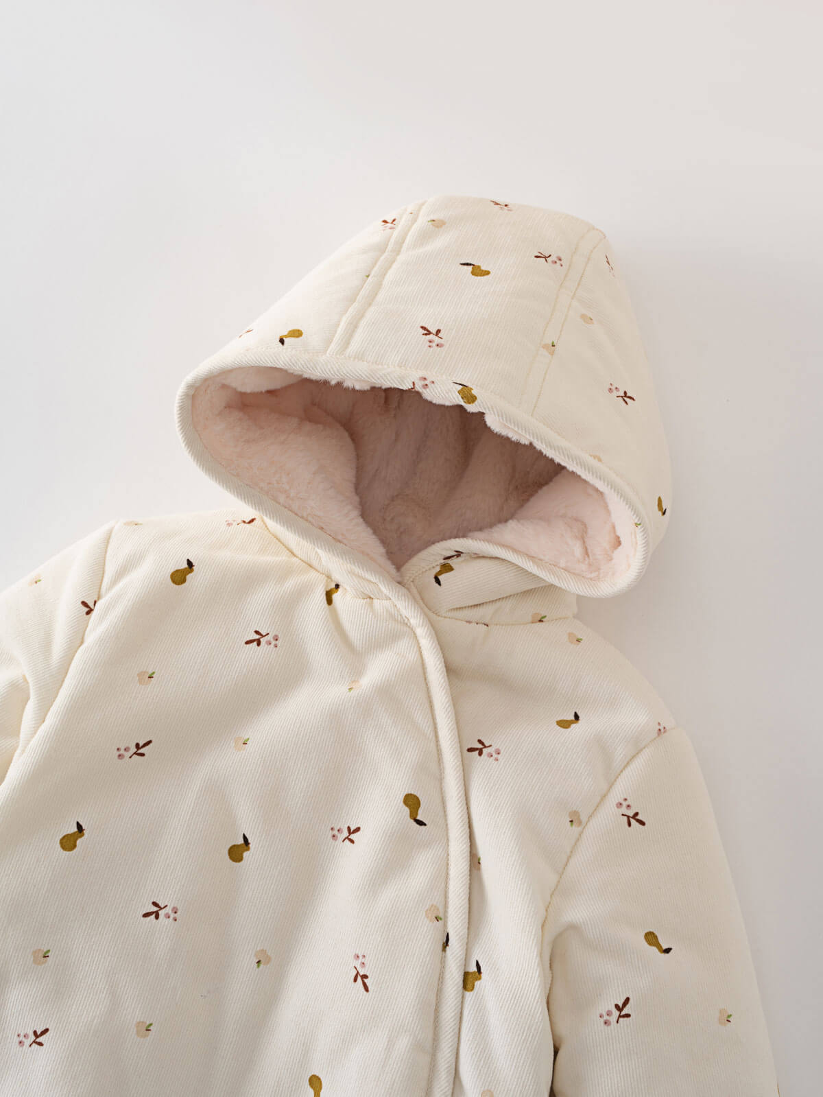Cream hooded baby pram suit with fruit pattern on a light gray  Printed Pram Suit - Autumn Harvest Ecru Baby girl