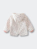 Light pink hooded raincoat with small floral print pattern laid flat Printed Raincoat - Wild Flowers Ecru Girls