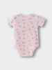 Pink baby bodysuit with small floral pattern laid flat on surface Printed Short Sleeve Bodysuit - Daisy Chain Baby girl