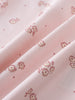 Close-up of pink fabric with small floral print pattern Printed Short Sleeve Bodysuit - Daisy Chain Baby girl