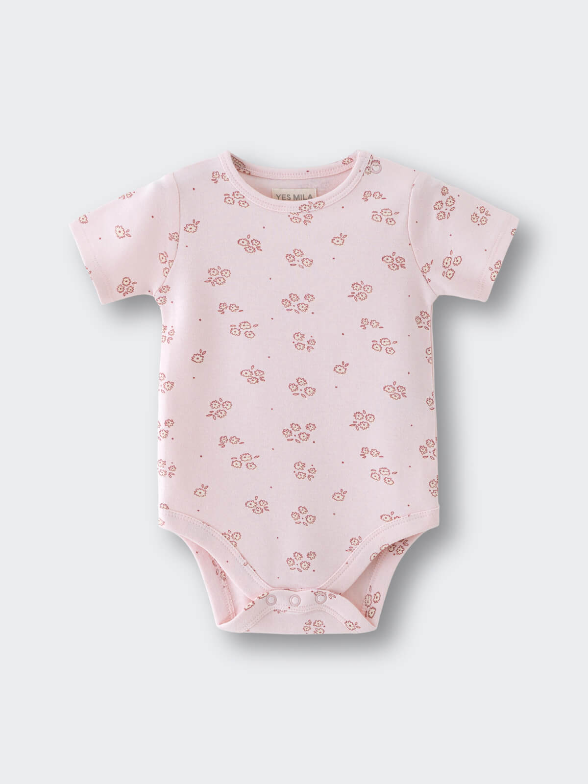 Light pink baby bodysuit with small floral print pattern throughout Printed Short Sleeve Bodysuit - Daisy Chain Baby girl