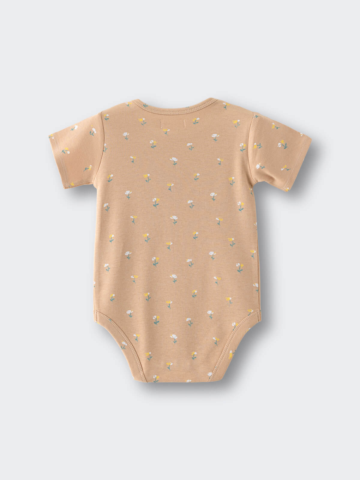 Peach-colored baby bodysuit with small floral print pattern laid flat Printed Short Sleeve Bodysuit - Floral Bloom Baby girl