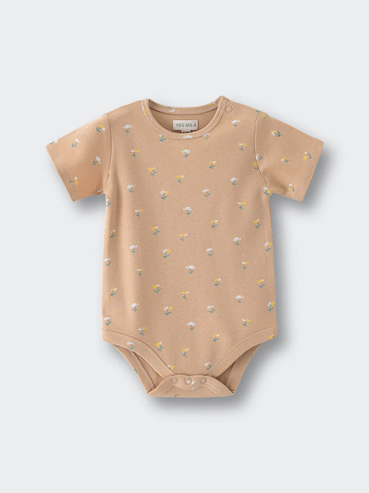 Beige baby bodysuit with small floral print pattern on white background Printed Short Sleeve Bodysuit - Floral Bloom Baby girl