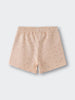 Peach-colored shorts with small floral and dot print pattern Printed Shorts - Flower Power Girls