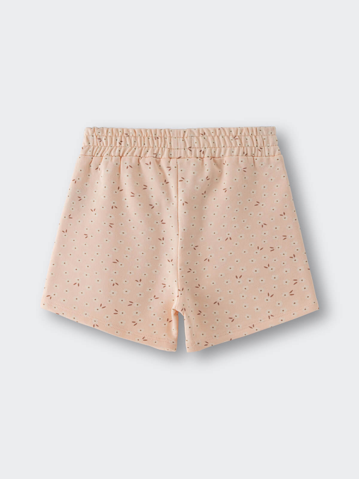 Peach-colored shorts with small floral and dot print pattern Printed Shorts - Flower Power Girls
