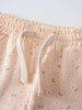 Close-up of elastic waistband with drawstring on peach patterned fabric Printed Shorts - Flower Power Girls