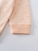 Close-up of peach sweatshirt sleeve with dotted pattern and ribbed cuff printed Sweatshirt - Flower Power Girls