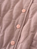 Close-up of a quilted jacket with pink buttons on a light brown background Quilted Jacket - Blush Baby girl