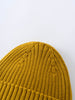 Gold knit beanie on a light gray background Ribbed Beanie - Golden Pear Boys