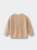 Beige knitted sweater on a light gray background