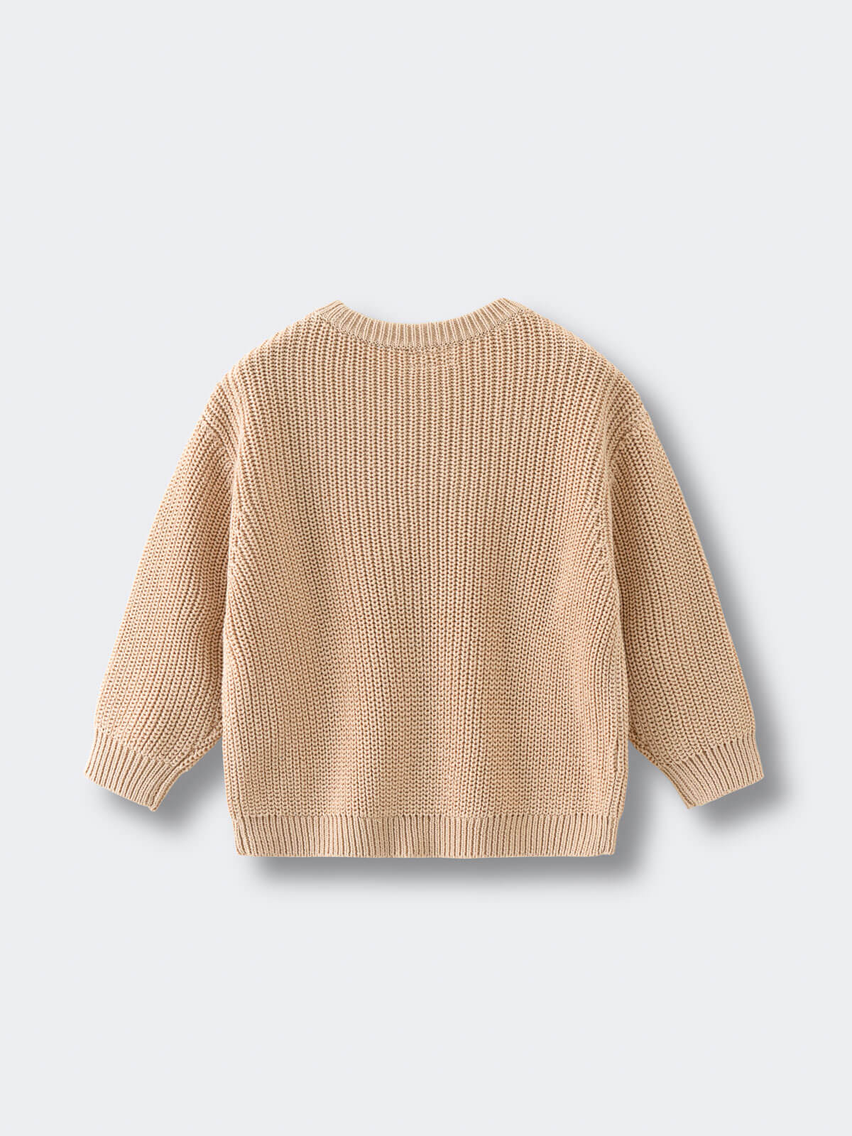 Beige knitted sweater on a light gray background