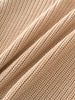 Close-up of beige knitted fabric