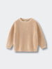 Beige sweater on a light gray background