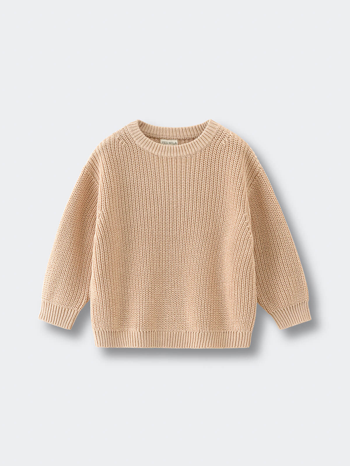 Beige sweater on a light gray background