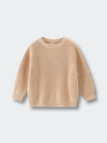 Beige sweater on a light gray background