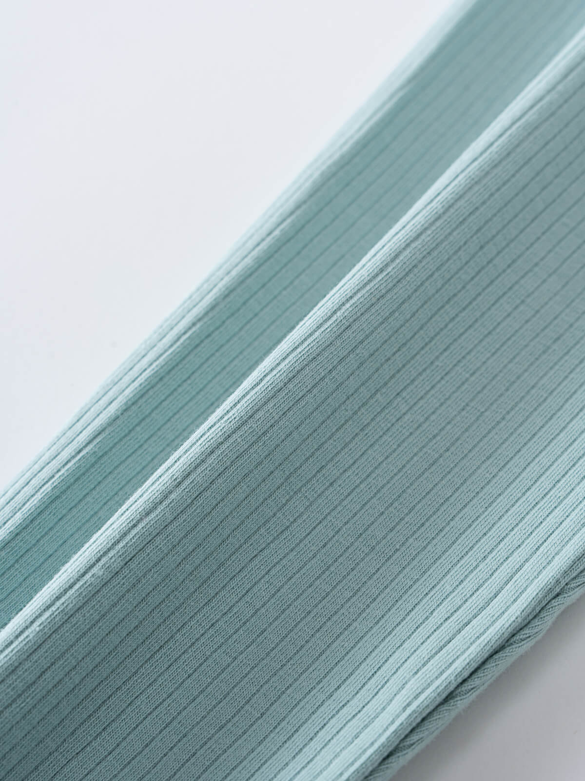 Close-up of ribbed fabric in light blue-green showing textured detail Ribbed Leggings - Aloe Girls