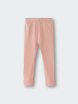 Ribbed peach-colored leggings laid flat on a light gray background ribbed Leggings - Toasted Peach Girls