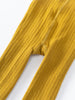 Close-up of mustard yellow ribbed fabric tights showing texture and seam detail Ribbed Tights 2 Pack - Golden Pear/Ecru Girls
