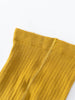 Close-up of mustard yellow ribbed fabric with visible seam detail Ribbed Tights 2 Pack - Golden Pear/Ecru Girls