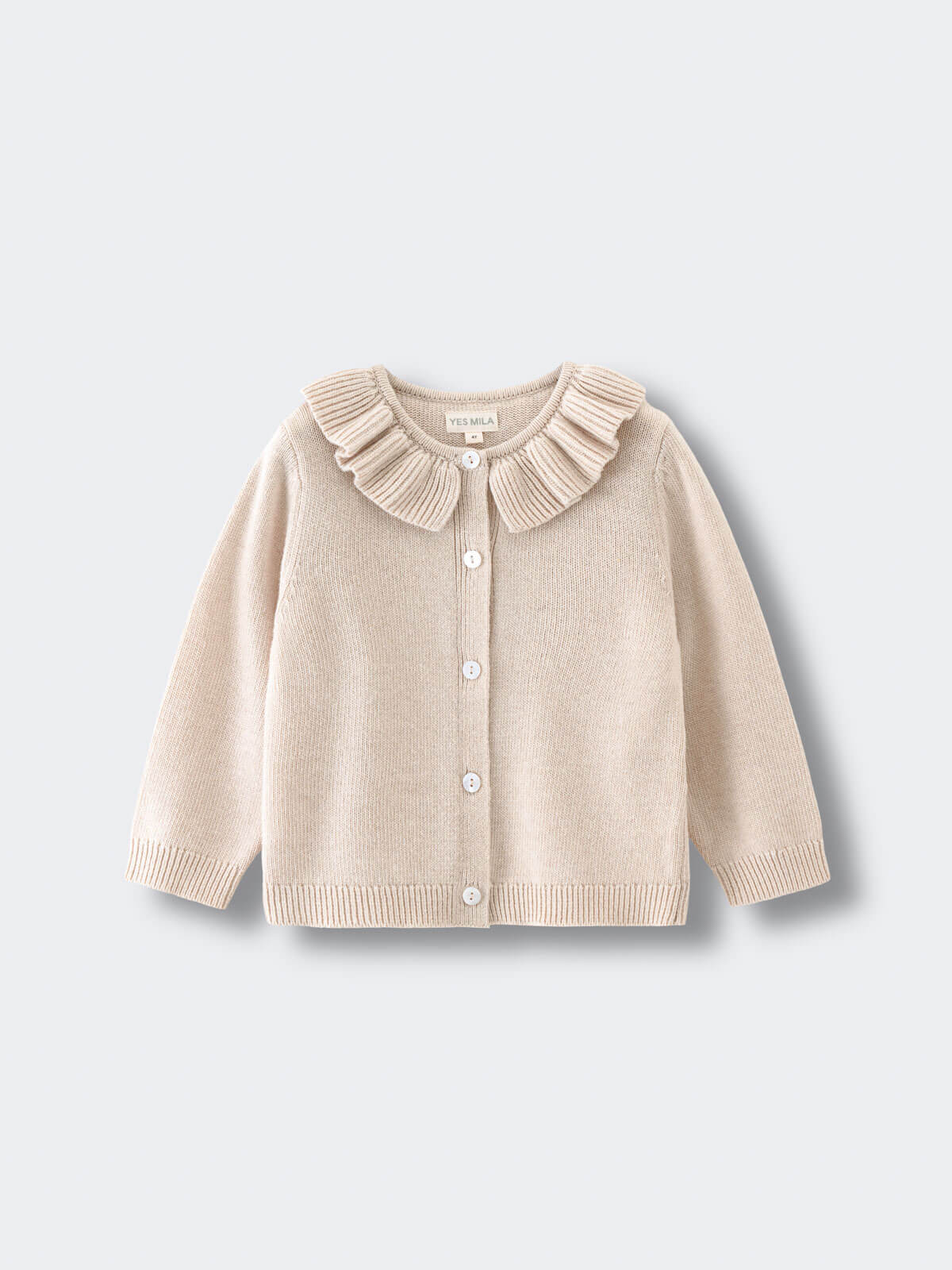 Beige cardigan with ruffled collar on a light gray background Ruffle Cardigan - Ecru Girls