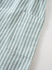 Close-up of folded striped fabric in mint green and white ruffle Playsuit - Mint Stripe Girls