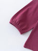 Close-up of a maroon fabric with a white background Ruffle Top - Plum Jam Girls