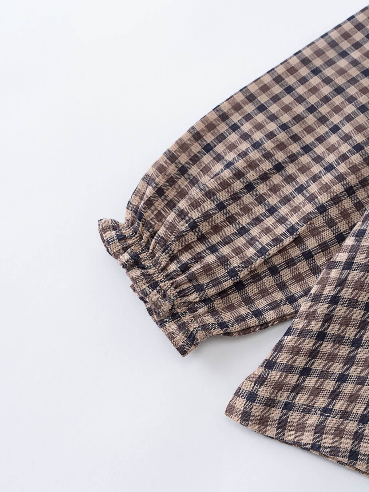 Brown and navy checkered shirt on a white background Ruffle Woven Blouse - Muslin Cotton Check Girls