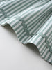 Close-up of green and white striped fabric with gathered ruffle detail shirred Top - Mint Stripe Girls
