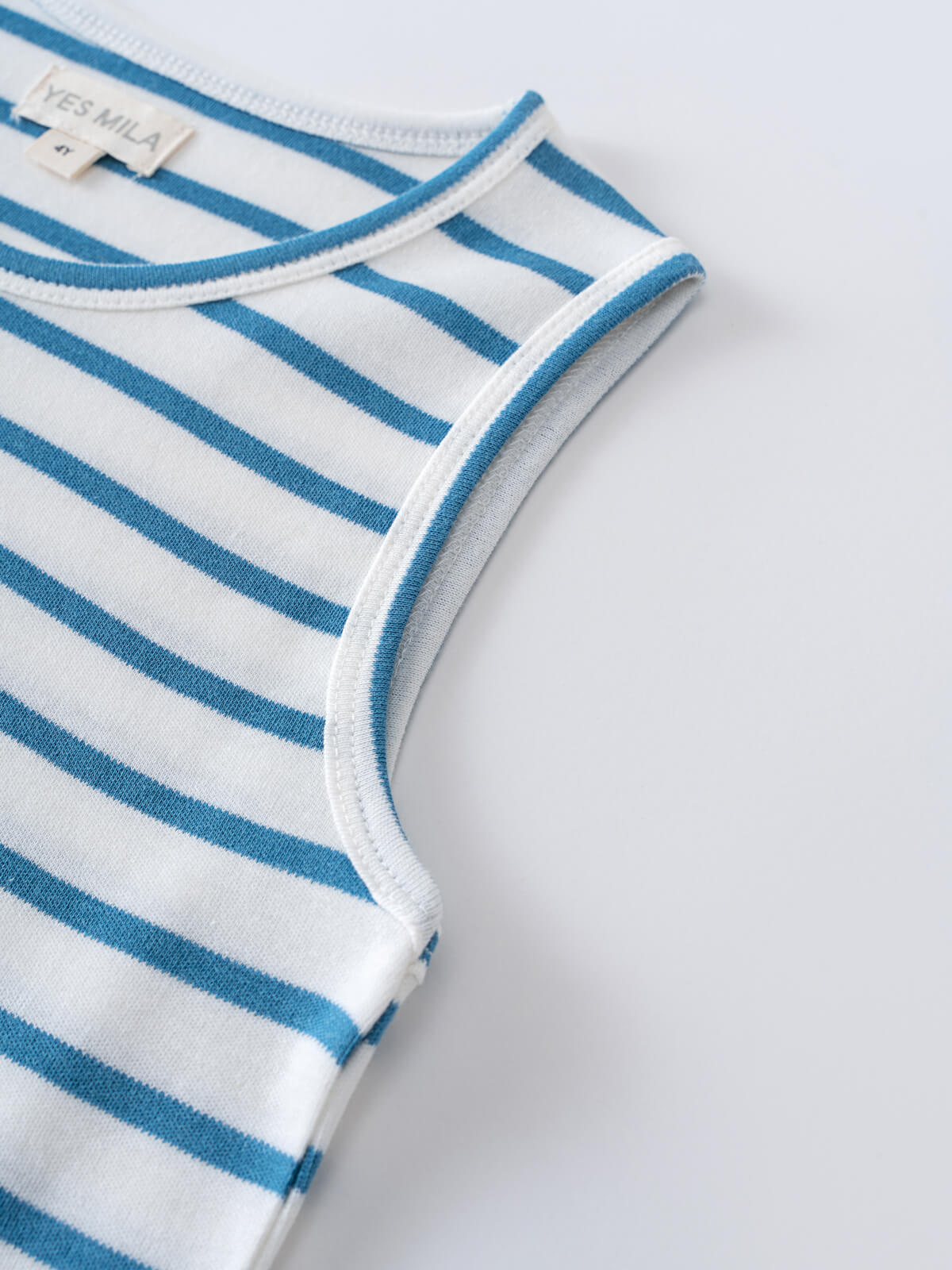 Close-up of a blue and white striped sleeveless tee showing neckline and armhole Sleeveless Tee - Blue Stripe Boys