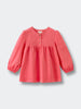 Pink long-sleeve top on a light gray background Three Button Blouse - Cloudberry Girls