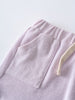 Close-up of lilac towelling shorts with pocket and cream drawstring waistband Towelling Shorts - Lilac Girls