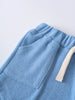Close-up of blue towelling shorts with beige drawstring detail Towelling Shorts - Sky Blue Boys