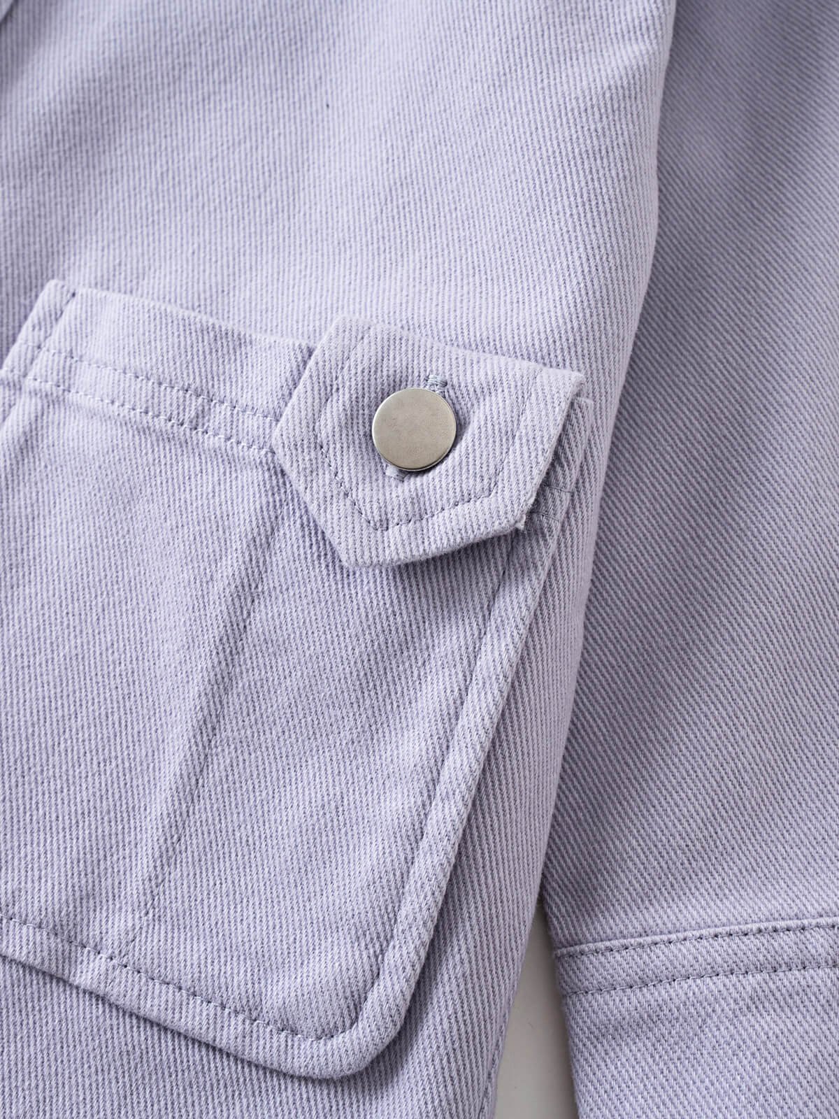 Close-up of a lilac jacket pocket with silver snap button detail twill Jacket - Lilac Girls