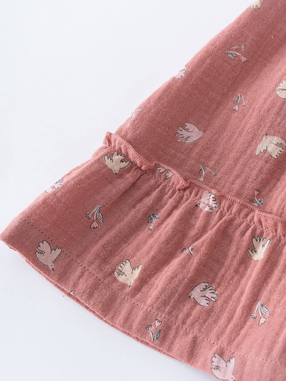 Pink textured fabric with small patterns on a white background Woven Skirt - Bird And Blossom Rosehip Girls