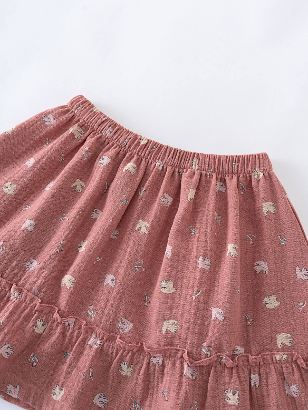 Pink skirt with subtle pattern on a white background Woven Skirt - Bird And Blossom Rosehip Girls