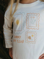 Children's long-sleeve shirt with 'Sunny Day Club' design featuring sun, flowers, and text. Zoey Long Sleeve Tee - Sunny Club Day Girls